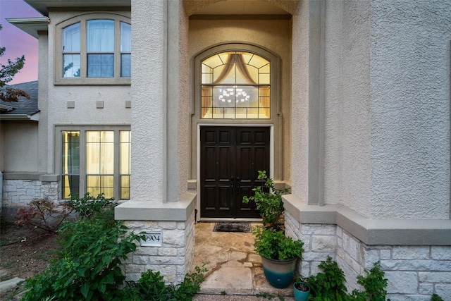 9904 Chester Cv, Austin, TX 78750 - entrance to property with stone siding and stucco siding