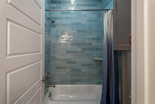 503 Fire Dance, Horseshoe Bay, TX 78657 - bathroom featuring shower / bath combo with shower curtain