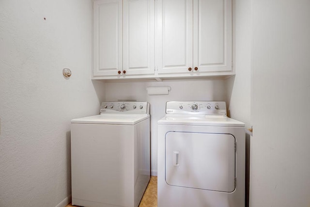 428 Summit Cir, Fredericksburg, TX 78624 - laundry room featuring washer and dryer and cabinet space