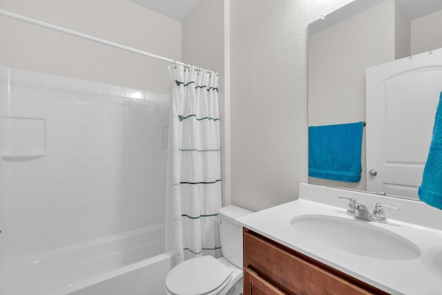 1501 Cliffbrake Way, Georgetown, TX 78626 - bathroom featuring toilet, vanity, shower / bath combination with curtain, and a textured wall