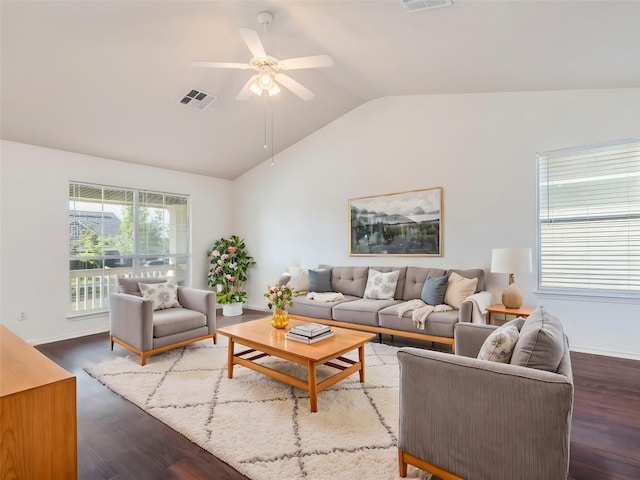 581 Sampson, Kyle, TX 78640 - living room with vaulted ceiling, ceiling fan, wood finished floors, and baseboards