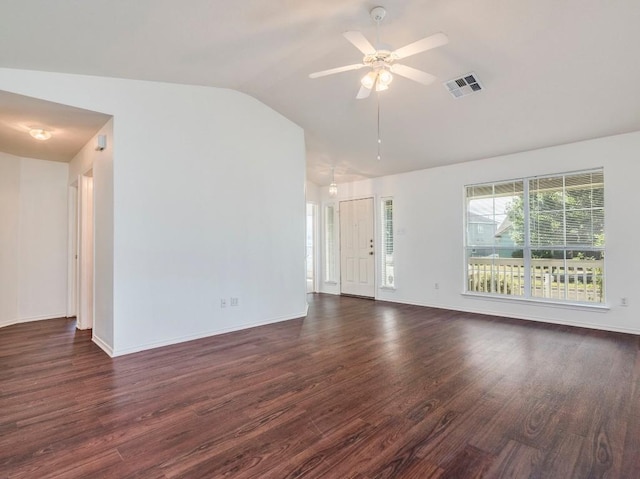 581 Sampson, Kyle, TX 78640 - unfurnished living room featuring dark wood-style floors, vaulted ceiling, ceiling fan, and baseboards