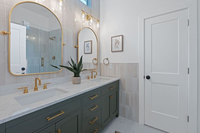 1607 Forest St, Georgetown, TX 78626 - full bathroom with tile walls, double vanity, and a shower stall