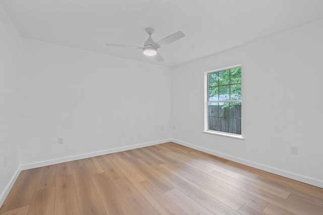 1607 Forest St, Georgetown, TX 78626 - spare room with light wood finished floors, baseboards, and ceiling fan