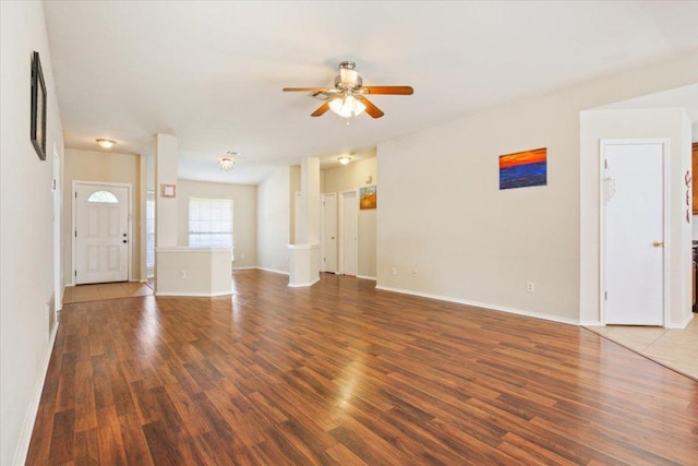 3005 Sugar Berry Cv, Round Rock, TX 78664 - unfurnished living room with ceiling fan, wood finished floors, and baseboards