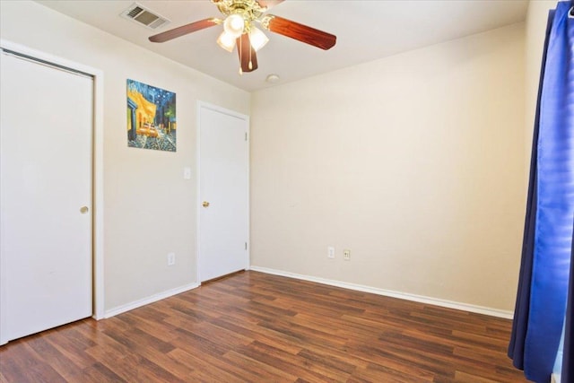 3005 Sugar Berry Cv, Round Rock, TX 78664 - unfurnished bedroom with wood finished floors, baseboards, and ceiling fan