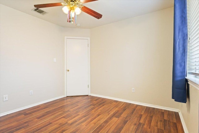 3005 Sugar Berry Cv, Round Rock, TX 78664 - spare room with a ceiling fan, wood finished floors, and baseboards