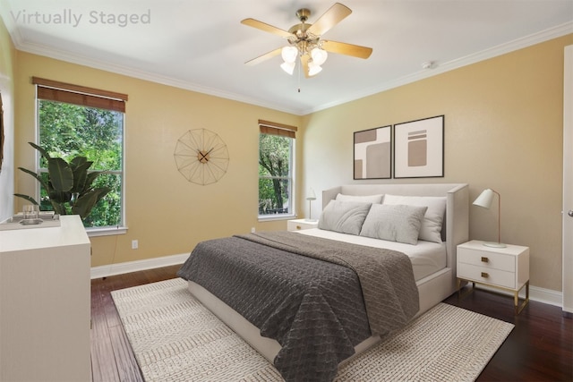 12109 Bryony Dr, Austin, TX 78739 - bedroom featuring multiple windows, baseboards, dark wood-style flooring, crown molding, and a ceiling fan