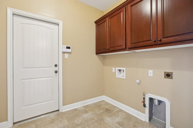12109 Bryony Dr, Austin, TX 78739 - washroom with hookup for a gas dryer, cabinet space, washer hookup, electric dryer hookup, and baseboards