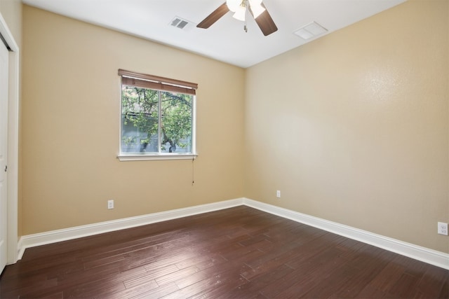 12109 Bryony Dr, Austin, TX 78739 - spare room featuring a ceiling fan, dark wood-style flooring, and baseboards