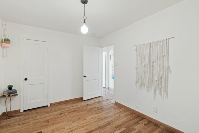 1303 Walnut Ave, Austin, TX 78702 - spare room with light wood finished floors and baseboards
