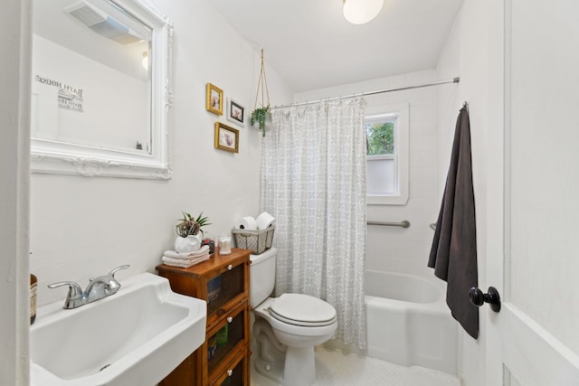 1303 Walnut Ave, Austin, TX 78702 - bathroom featuring a sink, toilet, and shower / bath combination with curtain