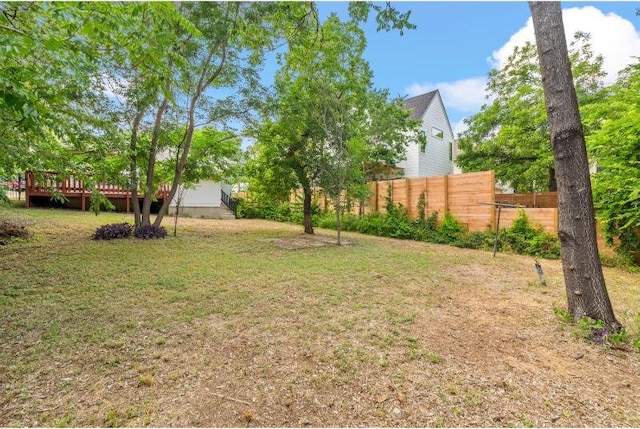 1303 Walnut Ave, Austin, TX 78702 - view of yard with a deck