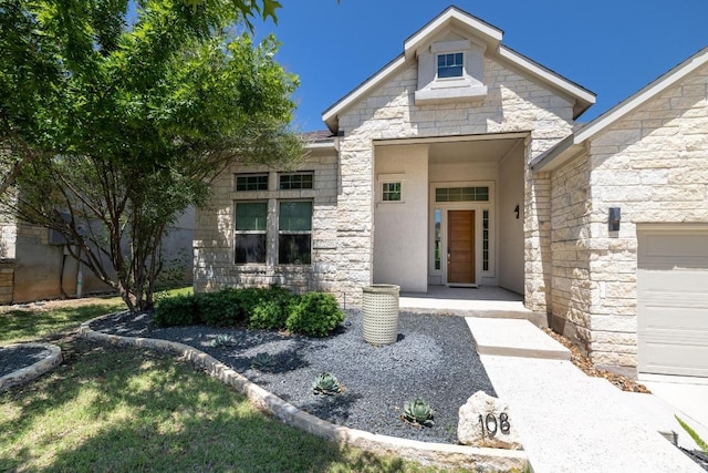 108 Panzano Dr, Georgetown, TX 78628 - doorway to property featuring stone siding