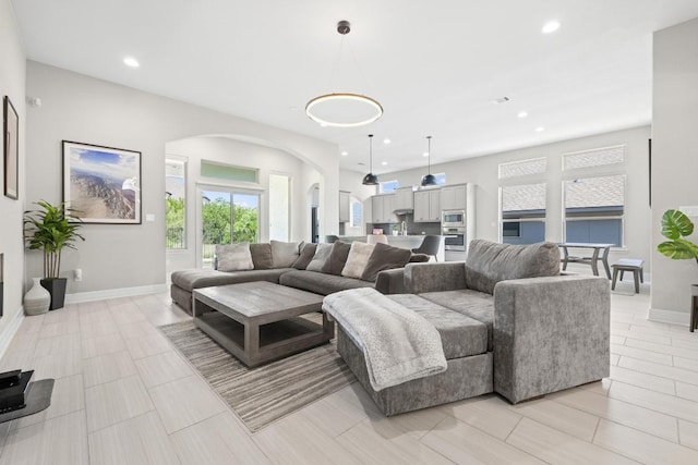 108 Panzano Dr, Georgetown, TX 78628 - living area with arched walkways and recessed lighting