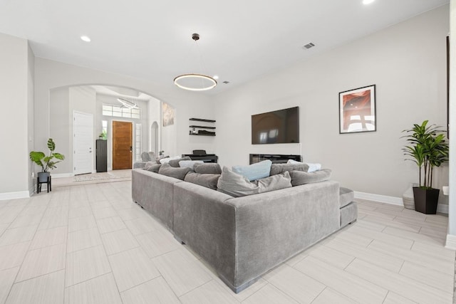 108 Panzano Dr, Georgetown, TX 78628 - living area with arched walkways and recessed lighting