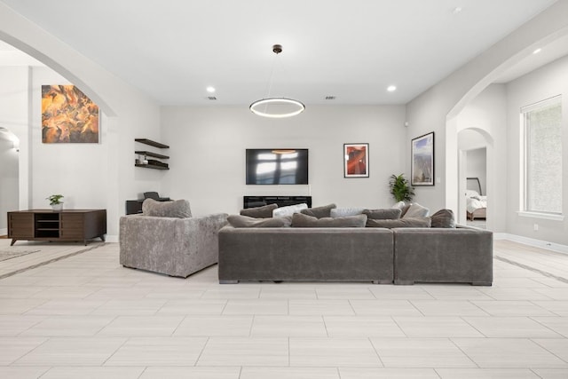 108 Panzano Dr, Georgetown, TX 78628 - living area featuring arched walkways and recessed lighting