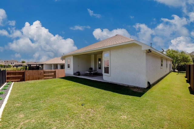 108 Panzano Dr, Georgetown, TX 78628 - back of property featuring a fenced backyard, stucco siding, and a patio