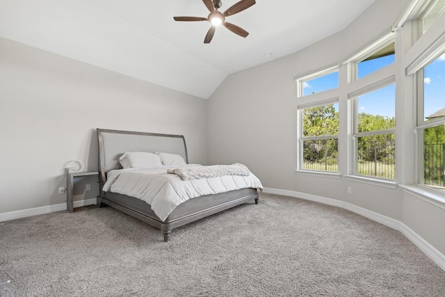 108 Panzano Dr, Georgetown, TX 78628 - carpeted bedroom featuring multiple windows, a ceiling fan, and lofted ceiling