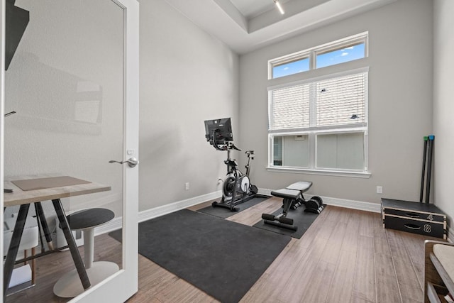 108 Panzano Dr, Georgetown, TX 78628 - workout area featuring wood finished floors and baseboards