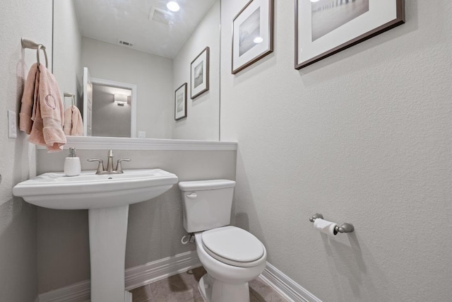 108 Panzano Dr, Georgetown, TX 78628 - half bathroom with toilet and baseboards