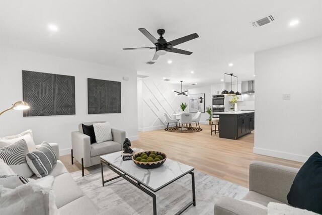 813 Cardiff Dr, Austin, TX 78745 - living room featuring recessed lighting, ceiling fan, and light wood-type flooring