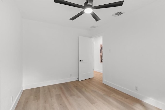813 Cardiff Dr, Austin, TX 78745 - unfurnished room with light wood-style flooring, a ceiling fan, and baseboards