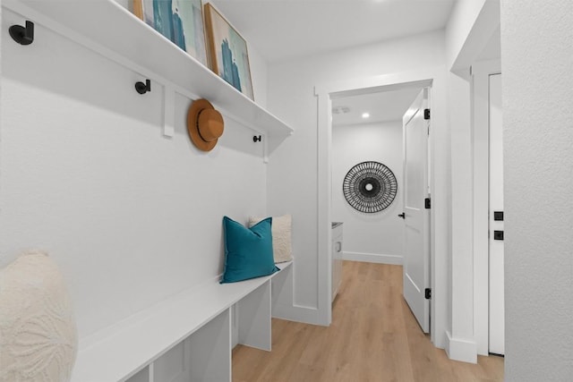 813 Cardiff Dr, Austin, TX 78745 - mudroom with light wood-style flooring and recessed lighting