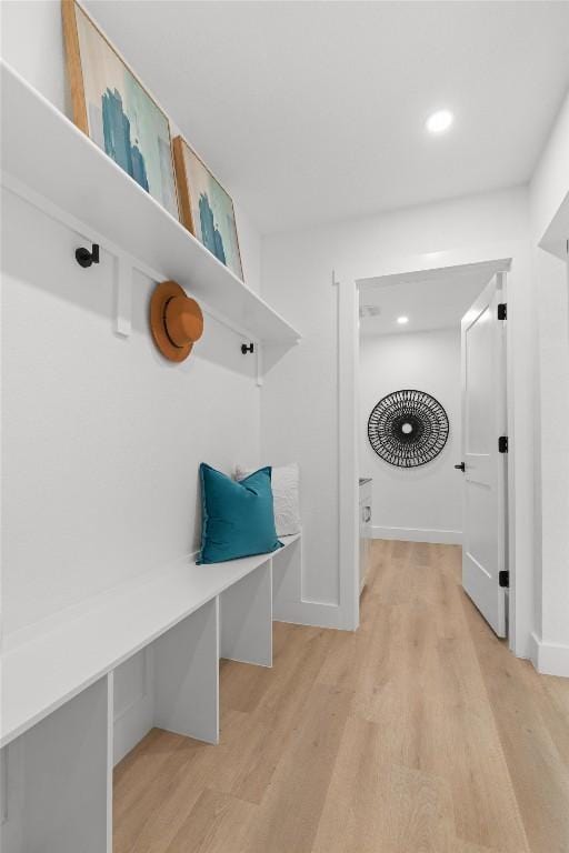 813 Cardiff Dr, Austin, TX 78745 - mudroom with light wood finished floors, recessed lighting, and baseboards