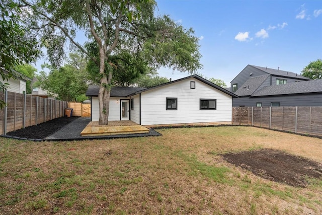 813 Cardiff Dr, Austin, TX 78745 - rear view of house featuring a wooden deck