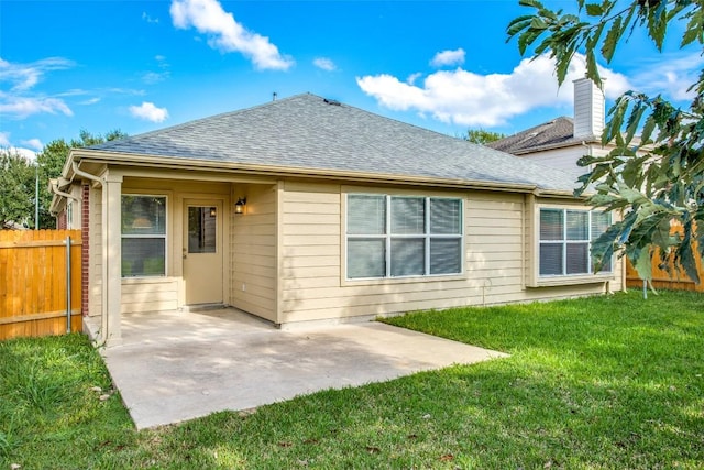 612 Arrowood Pl, Round Rock, TX 78665 - back of house featuring roof with shingles and a patio