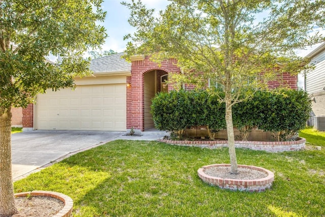 612 Arrowood Pl, Round Rock, TX 78665 - view of front of house featuring brick siding, a front lawn, driveway, an attached garage, and a shingled roof