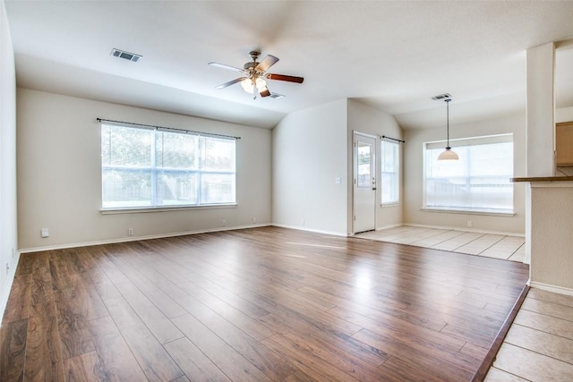 612 Arrowood Pl, Round Rock, TX 78665 - unfurnished living room featuring a ceiling fan, wood finished floors, and baseboards