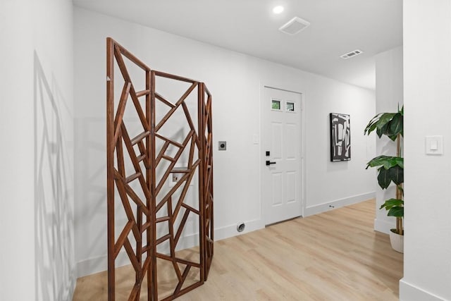 903 Cardiff Dr, Austin, TX 78745 - foyer featuring light wood-type flooring and baseboards