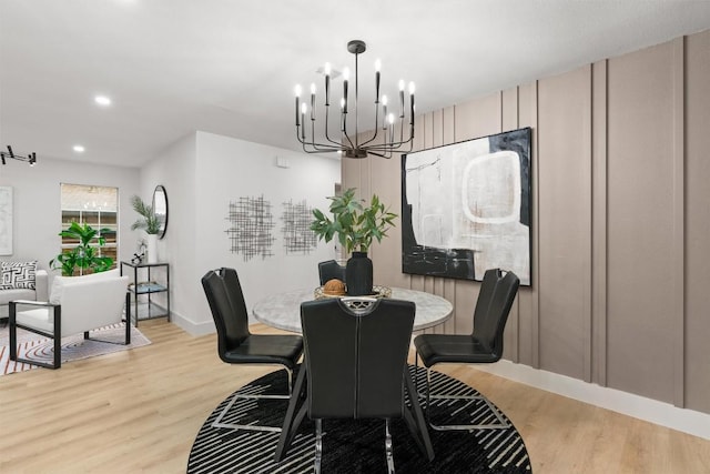903 Cardiff Dr, Austin, TX 78745 - dining space with light wood finished floors, a chandelier, recessed lighting, and baseboards