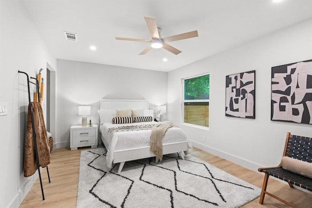 903 Cardiff Dr, Austin, TX 78745 - bedroom with light wood finished floors, recessed lighting, baseboards, and ceiling fan