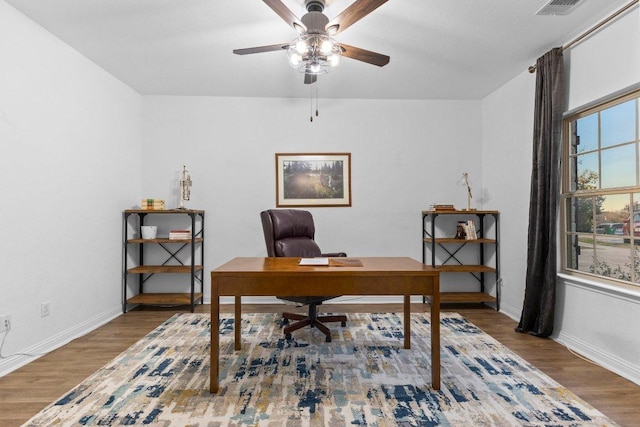 103 Bellagio Dr, Lakeway, TX 78734 - office space featuring ceiling fan, wood finished floors, and baseboards