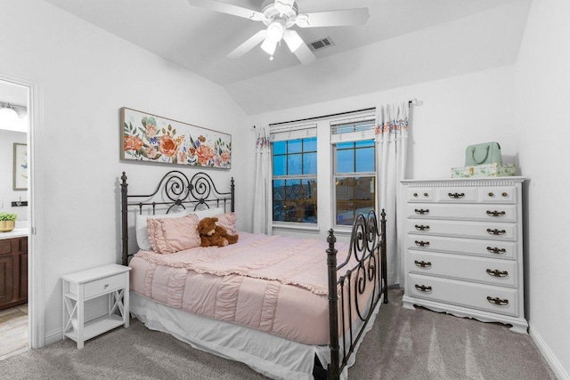 103 Bellagio Dr, Lakeway, TX 78734 - carpeted bedroom featuring lofted ceiling, baseboards, ceiling fan, and connected bathroom