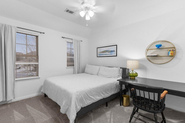 103 Bellagio Dr, Lakeway, TX 78734 - carpeted bedroom with baseboards and a ceiling fan