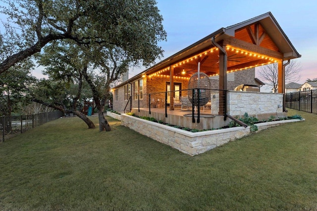 103 Bellagio Dr, Lakeway, TX 78734 - rear view of property featuring stone siding