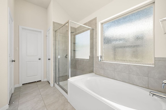 5012 Yucca Bloom Dr, Georgetown, TX 78626 - full bath featuring a bath, a shower stall, tile patterned floors, and baseboards