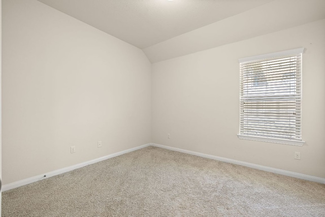 5012 Yucca Bloom Dr, Georgetown, TX 78626 - carpeted empty room with baseboards and vaulted ceiling