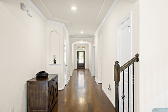 5012 Yucca Bloom Dr, Georgetown, TX 78626 - foyer with arched walkways, dark wood finished floors, ornamental molding, baseboards, and recessed lighting