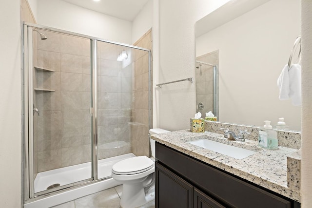 5012 Yucca Bloom Dr, Georgetown, TX 78626 - full bathroom with vanity, toilet, tile patterned floors, and a shower stall