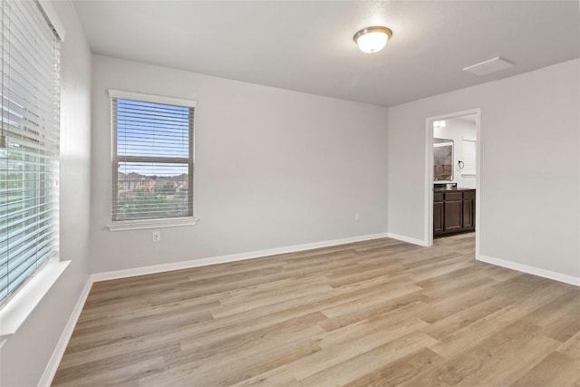 424 Wapiti Rd, Buda, TX 78610 - unfurnished room featuring light wood finished floors and baseboards