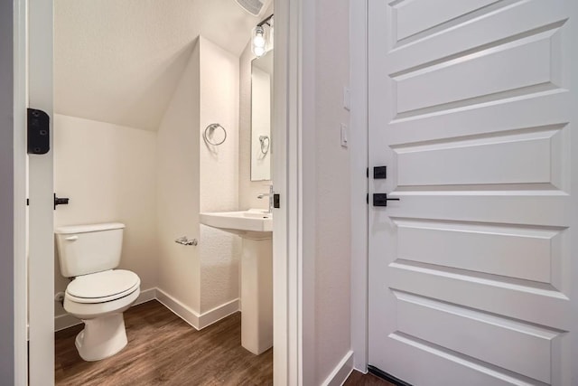2600 Gattis School Rd Unit 1102, Round Rock, TX 78664 - half bath featuring toilet, wood finished floors, and baseboards