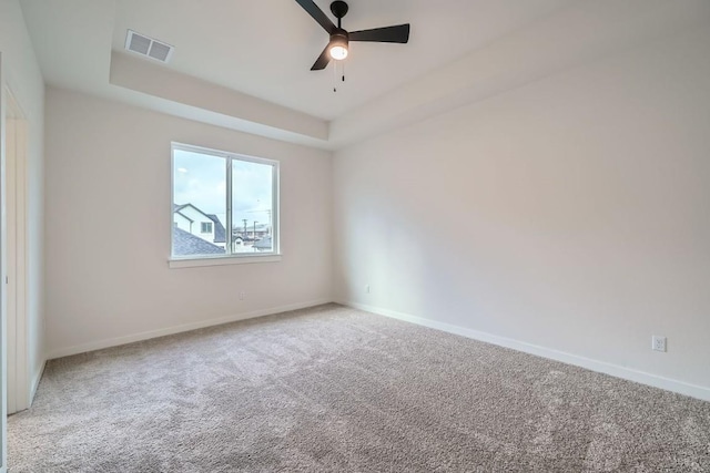 2600 Gattis School Rd Unit 1102, Round Rock, TX 78664 - carpeted spare room featuring baseboards, ceiling fan, and a raised ceiling