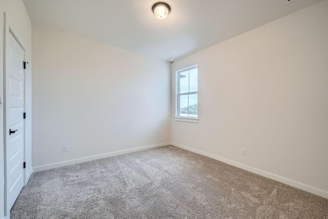 2600 Gattis School Rd Unit 1102, Round Rock, TX 78664 - carpeted spare room featuring baseboards