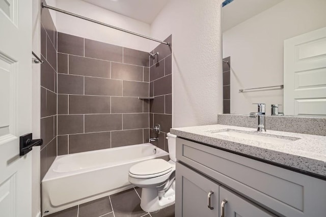2600 Gattis School Rd Unit 1102, Round Rock, TX 78664 - full bath with vanity, toilet,  shower combination, and tile patterned flooring