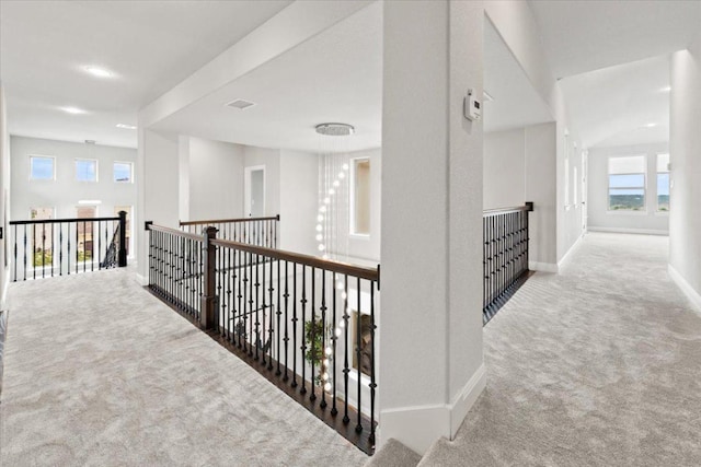 2037 Portobello Rd, Leander, TX 78641 - corridor with carpet, baseboards, and an upstairs landing